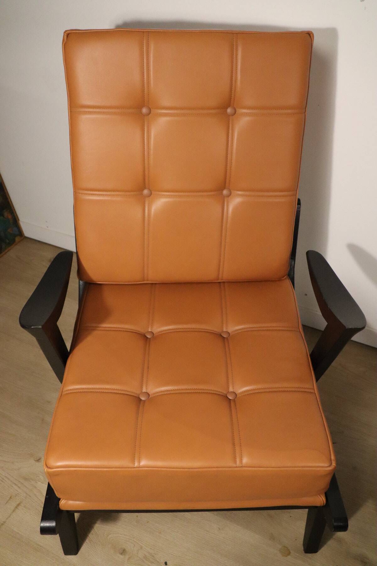 Paire de fauteuils vintage années 50 en bois noir et cuir caramel