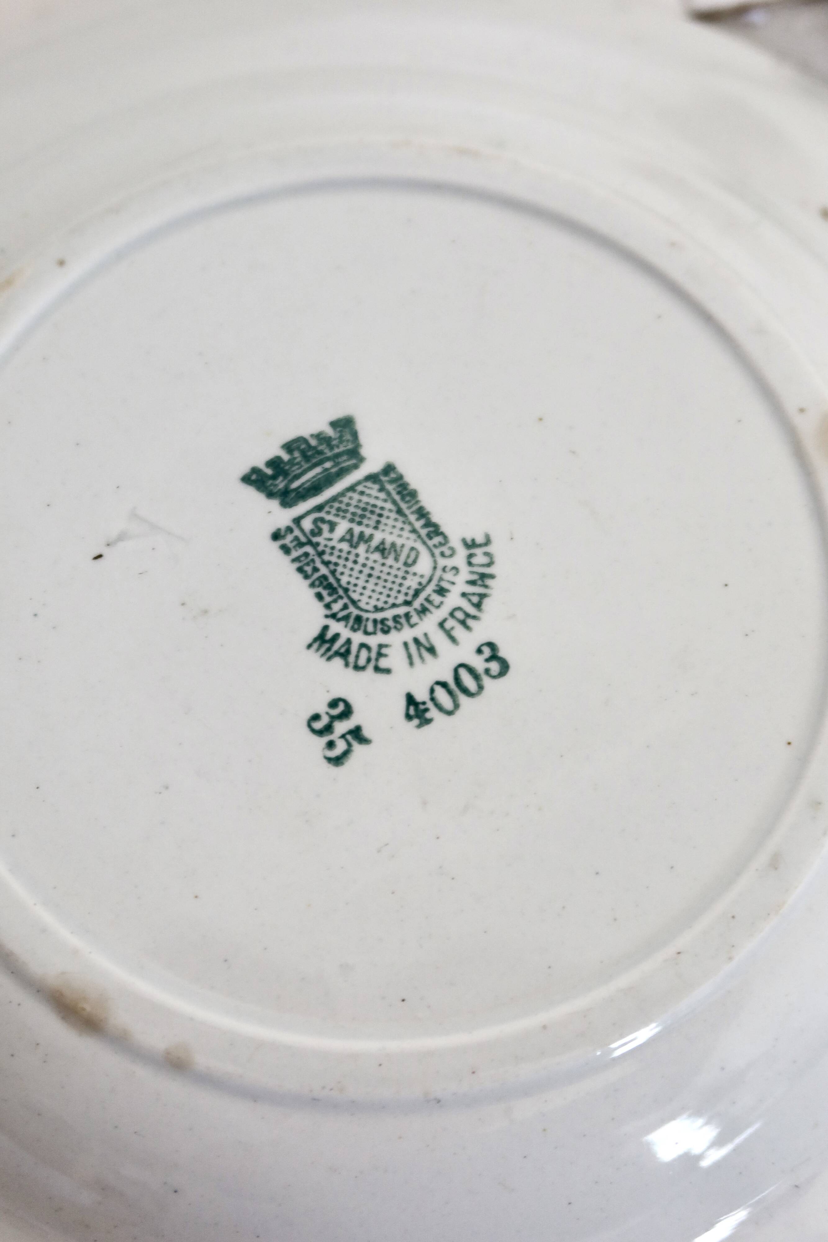 4 antique deep plates, ironstone, Saint Amand, 19th century.