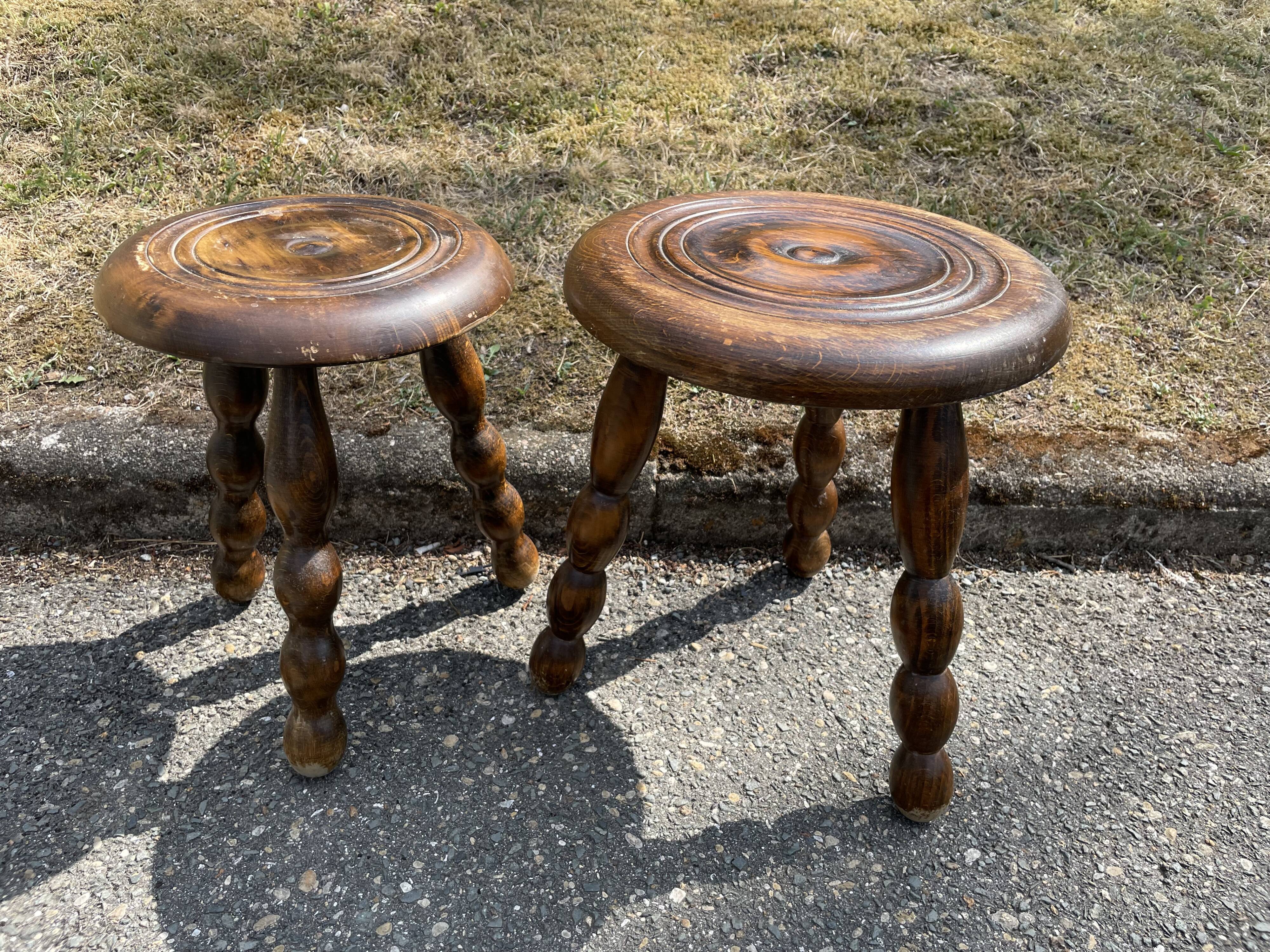 Duo of tripod oak stools