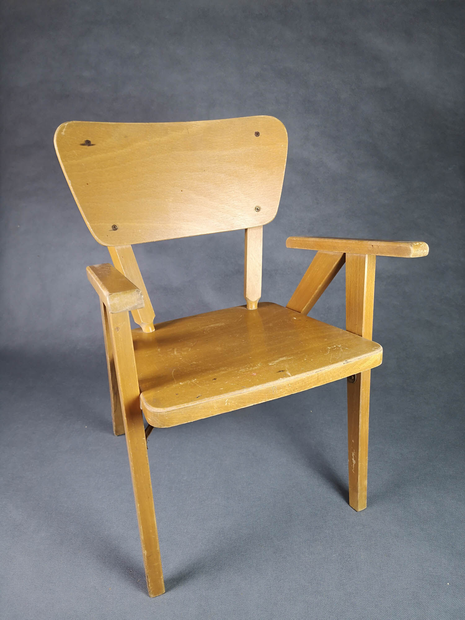 Vintage armchair child feet compass light wood