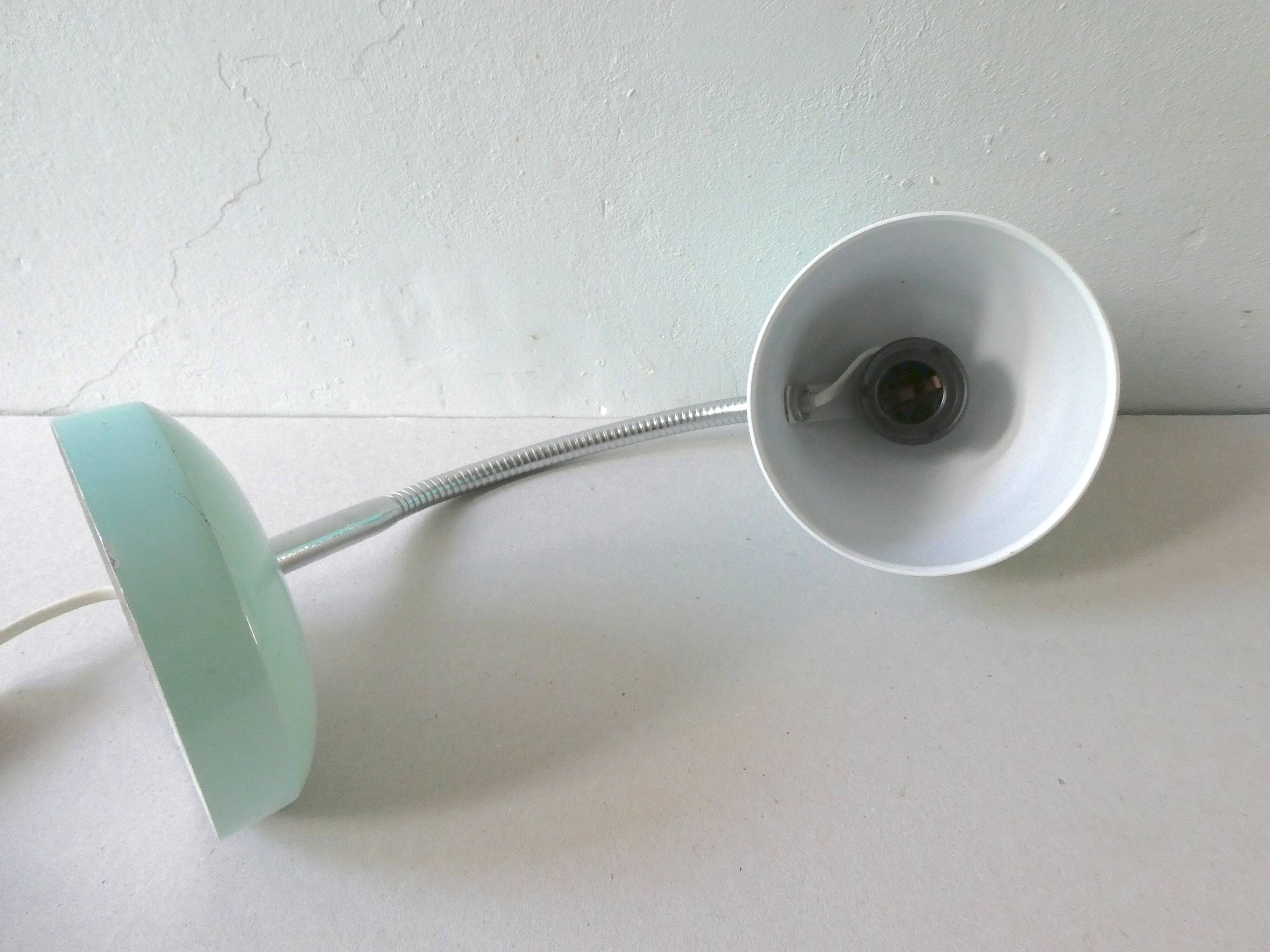 Articulated desk lamp, in turquoise blue metal, 1970s.