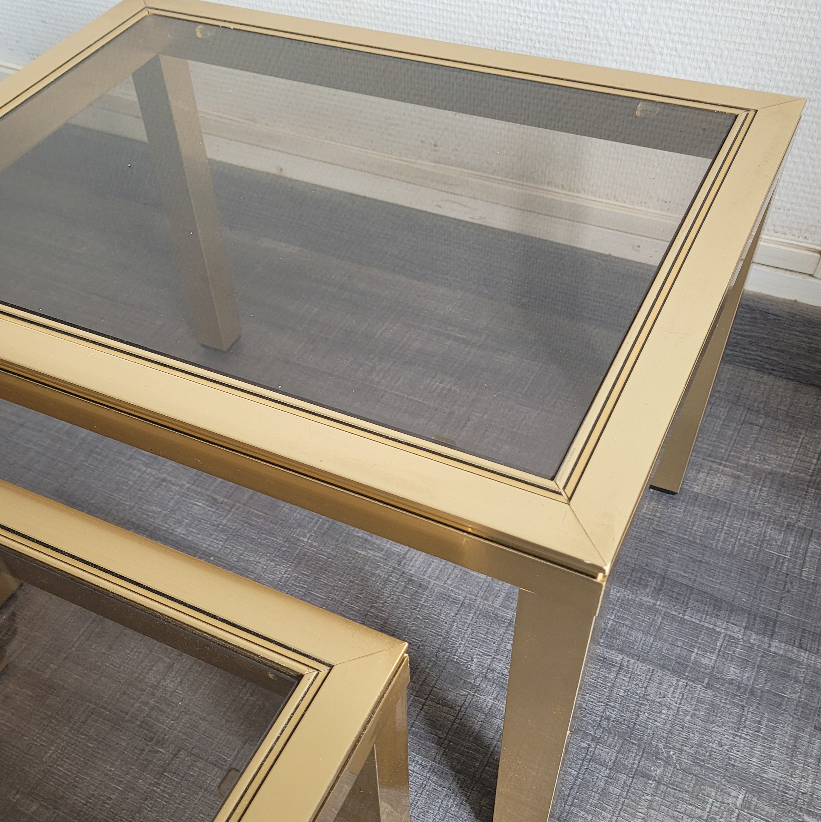 Gilded trundle tables and glass top