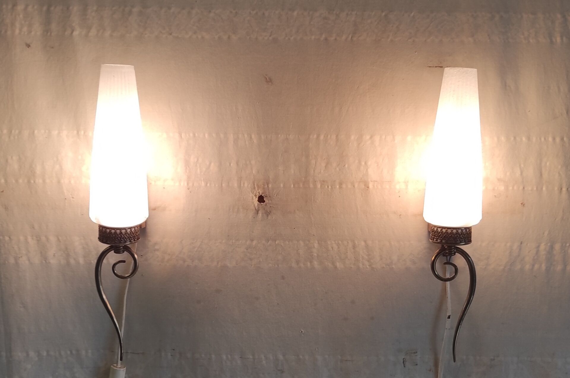 Modernist wall lights in brass and opaline - mid 20th century.