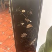 Magnificent black and gold lacquered Chinese cabinet.