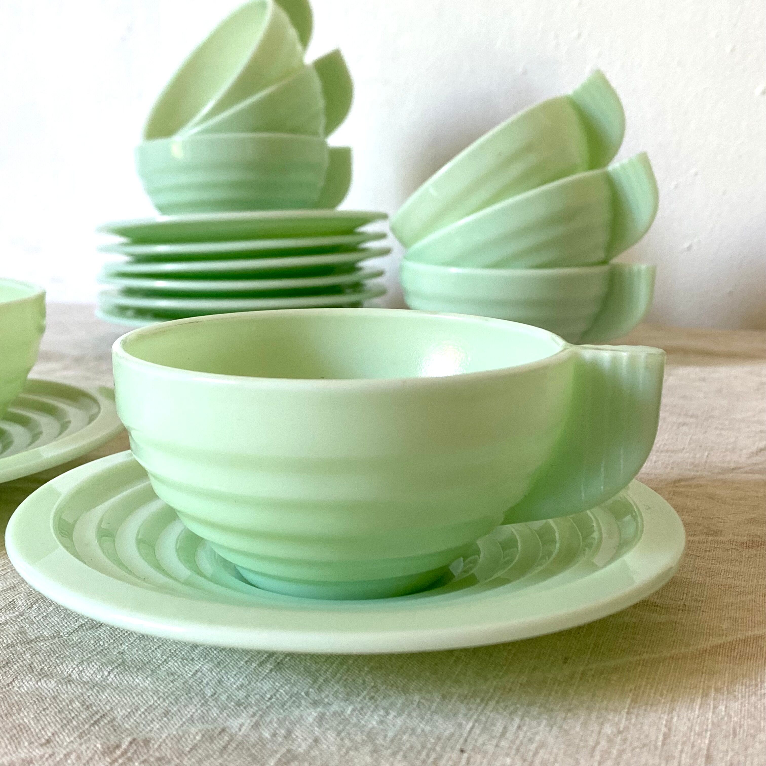 Art Deco cups in green opaline