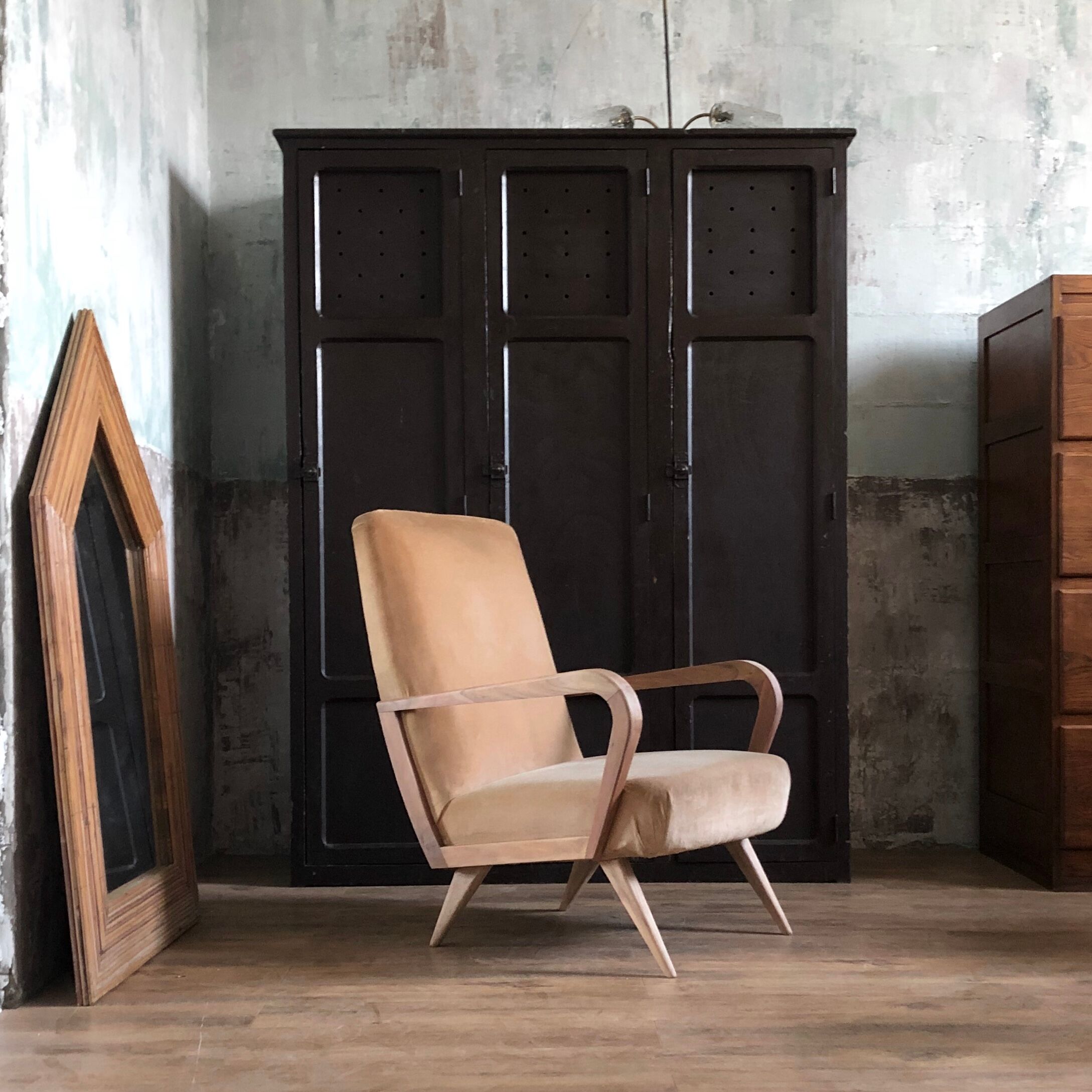 Velvet and wood armchair