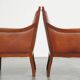 Majestic, luxurious set of 2 cognac-colored cowhide leather Art Deco design armchairs