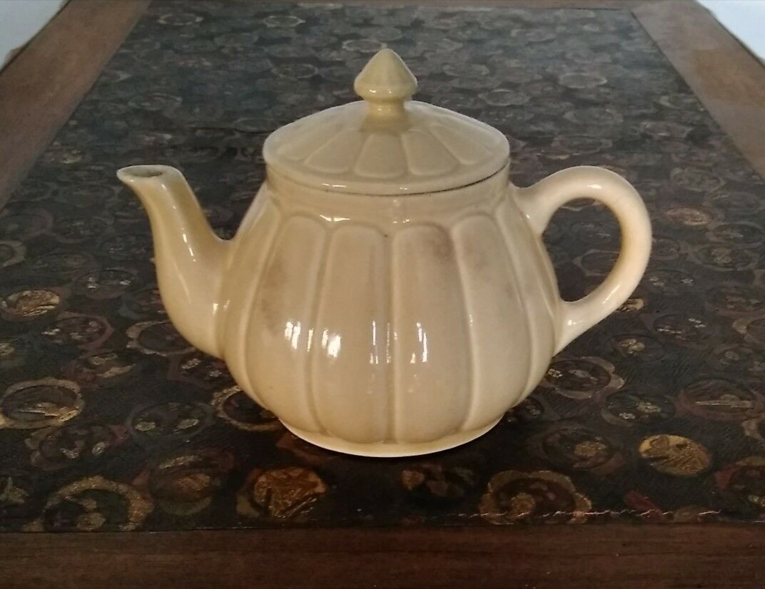 Cream-colored teapot