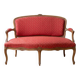 Two-seater Louis XV style sofa in red fabric.