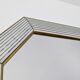 Octagonal mirror with brass parcloses by Jan Deknudt