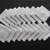 18 antique napkins in white linen with an embroidered geometric decoration