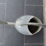 Zinc watering can with its apple