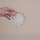 Round ashtray in chiseled glass