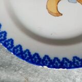 18th century earthenware decorative plate signed Saint Clement with royal coat of arms decoration