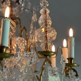 Bronze cage chandelier adorned with molded glass pendants in the shape of peacock feathers, circa 1800