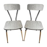 White and grey Formica chairs