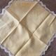 Tablecloth and 12 straw-colored napkins from the 50s.