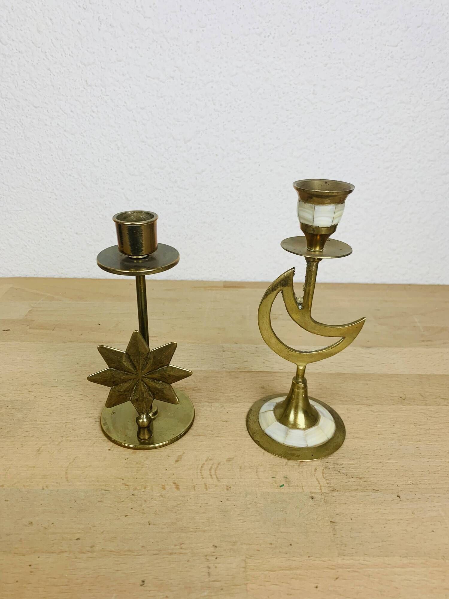 Pair of mother-of-pearl brass candlesticks with moon and sun