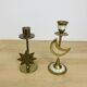 Pair of mother-of-pearl brass candlesticks with moon and sun