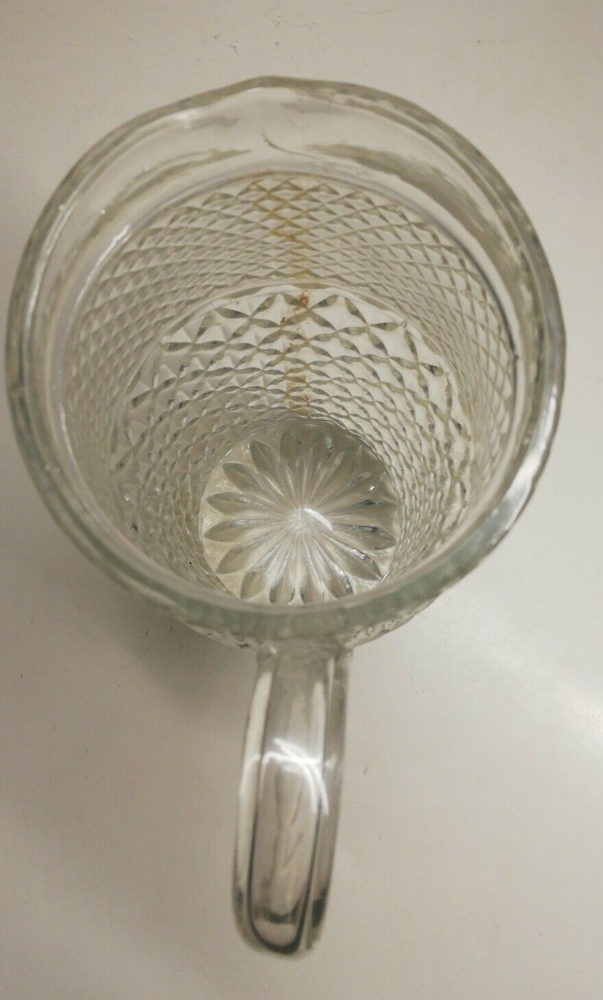 Vintage chiseled glass pitcher