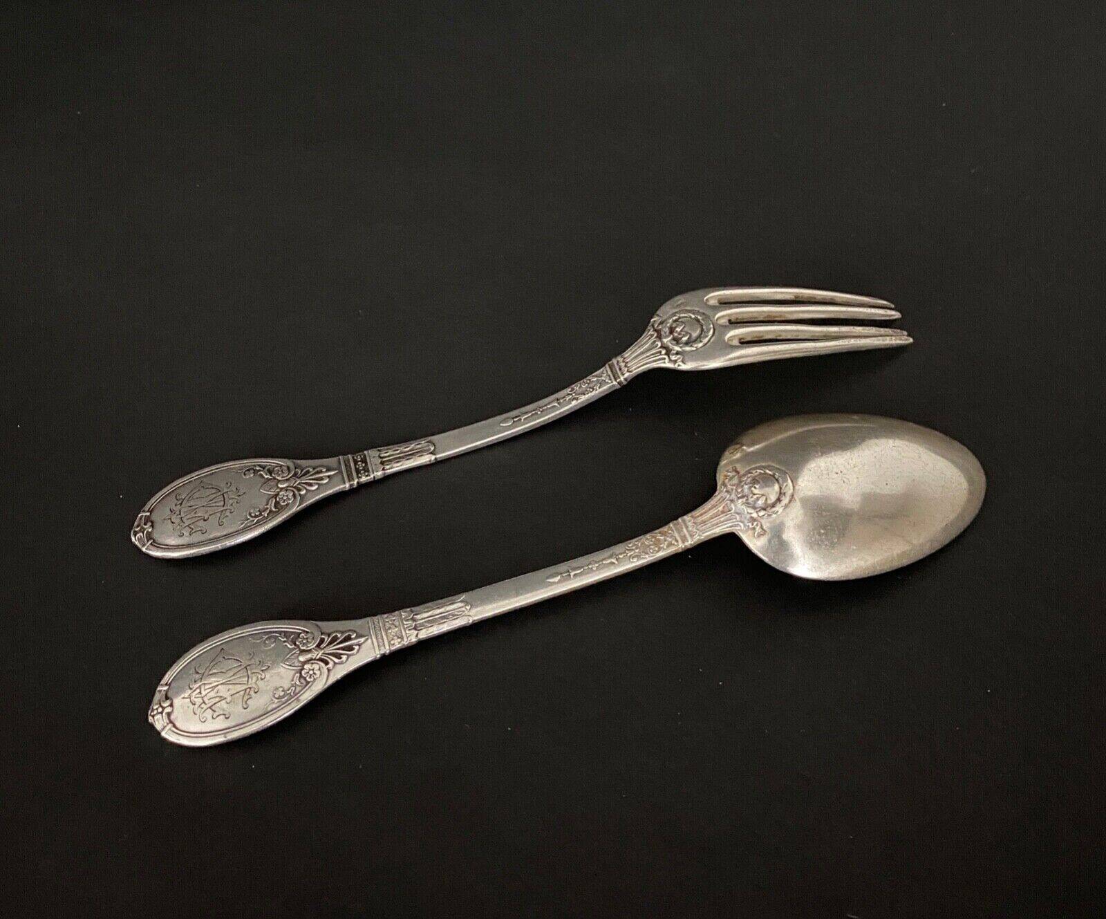 Pair of Gorini silver cutlery, Empire style, Minerva hallmark and richly decorated monogram