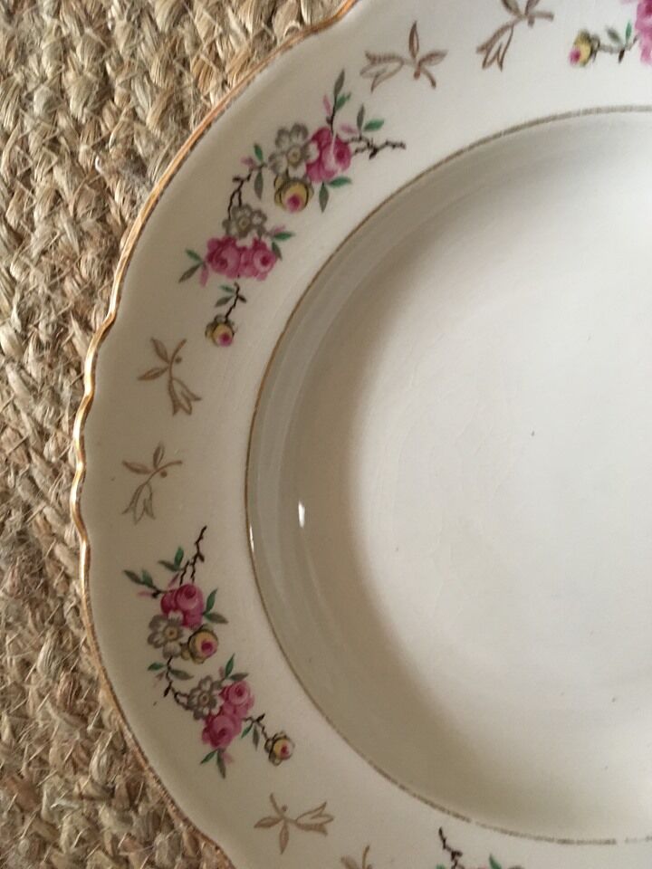 Old hollow plates mismatched ornate in red