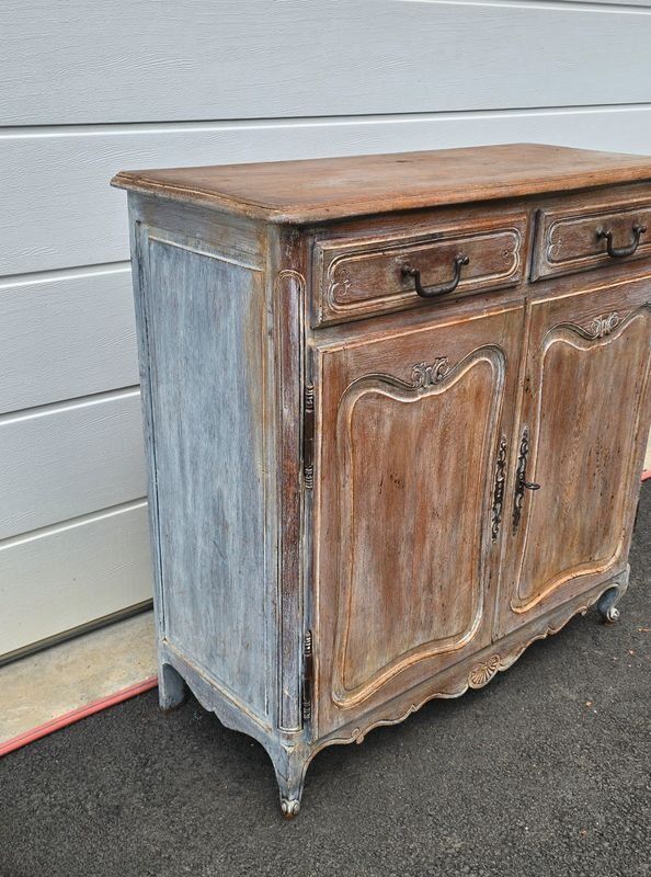 Antique chest of drawers with a cerused and patinated finish.