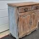 Antique chest of drawers with a cerused and patinated finish.