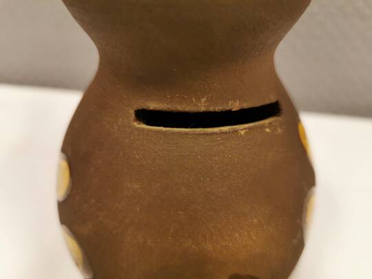 Old ceramic piggy bank. shaped like a duck from hegnetslund denmark