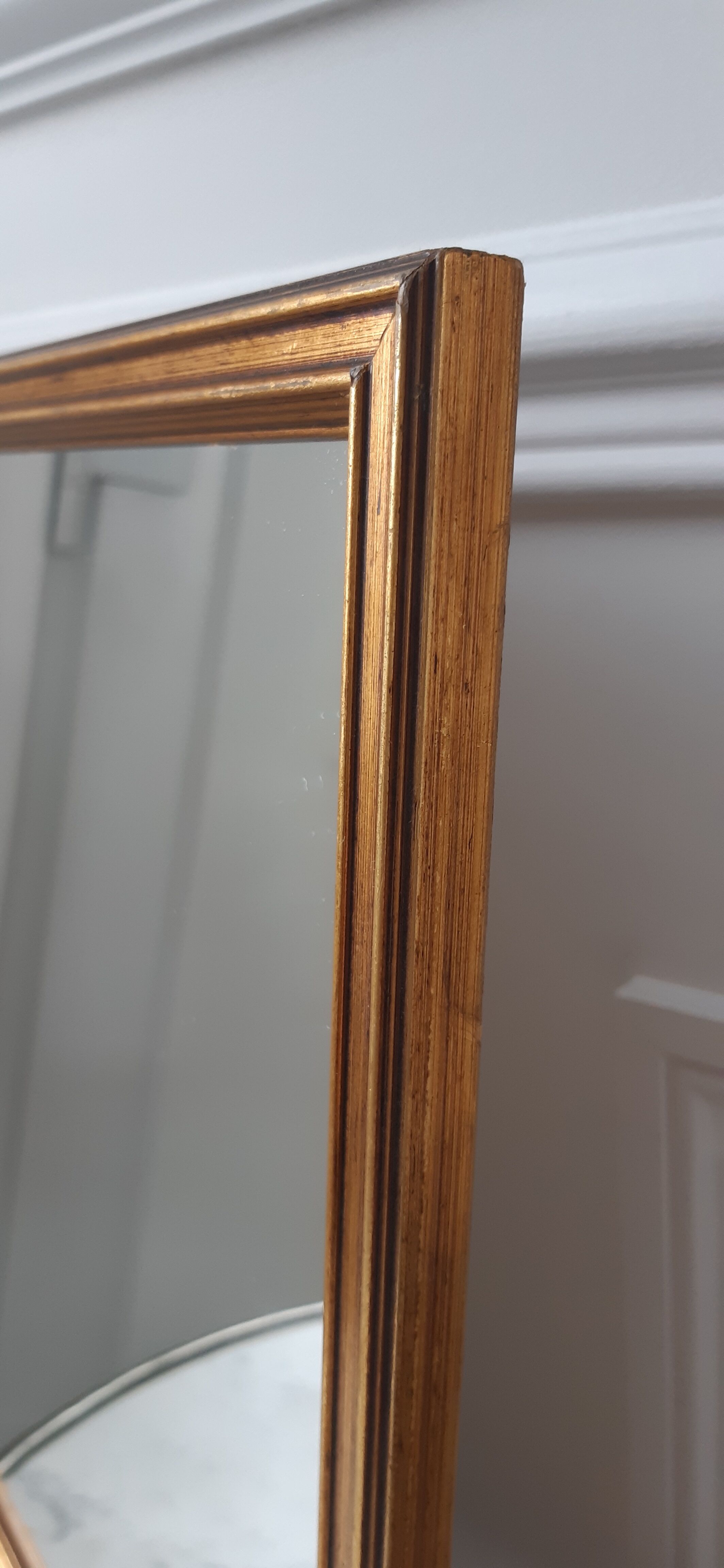 Mirror in gilded wood to hang 50s