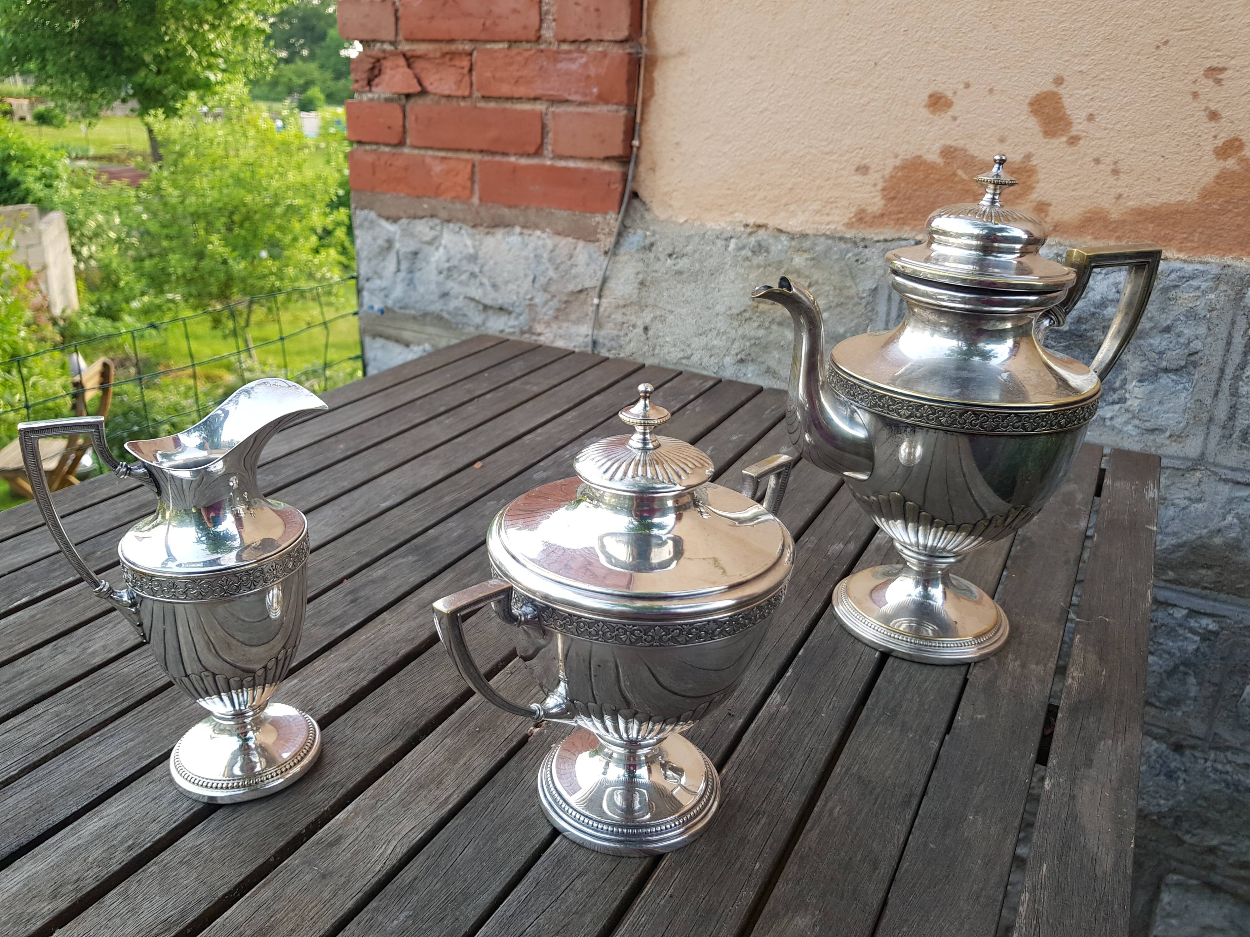 Silver metal coffee serving part