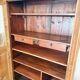 Glass-fronted cabinet in solid wood