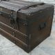 Old wooden and leather trunk, old brass nail trunk and leather strap