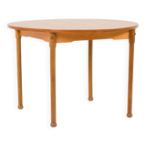 Teak round table with hidden extension, 1970s