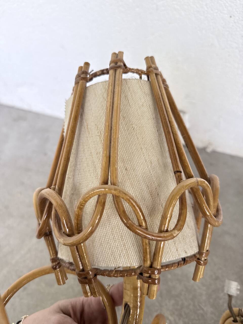 Pair of rattan wall lights by Louis Sognot, 1960.