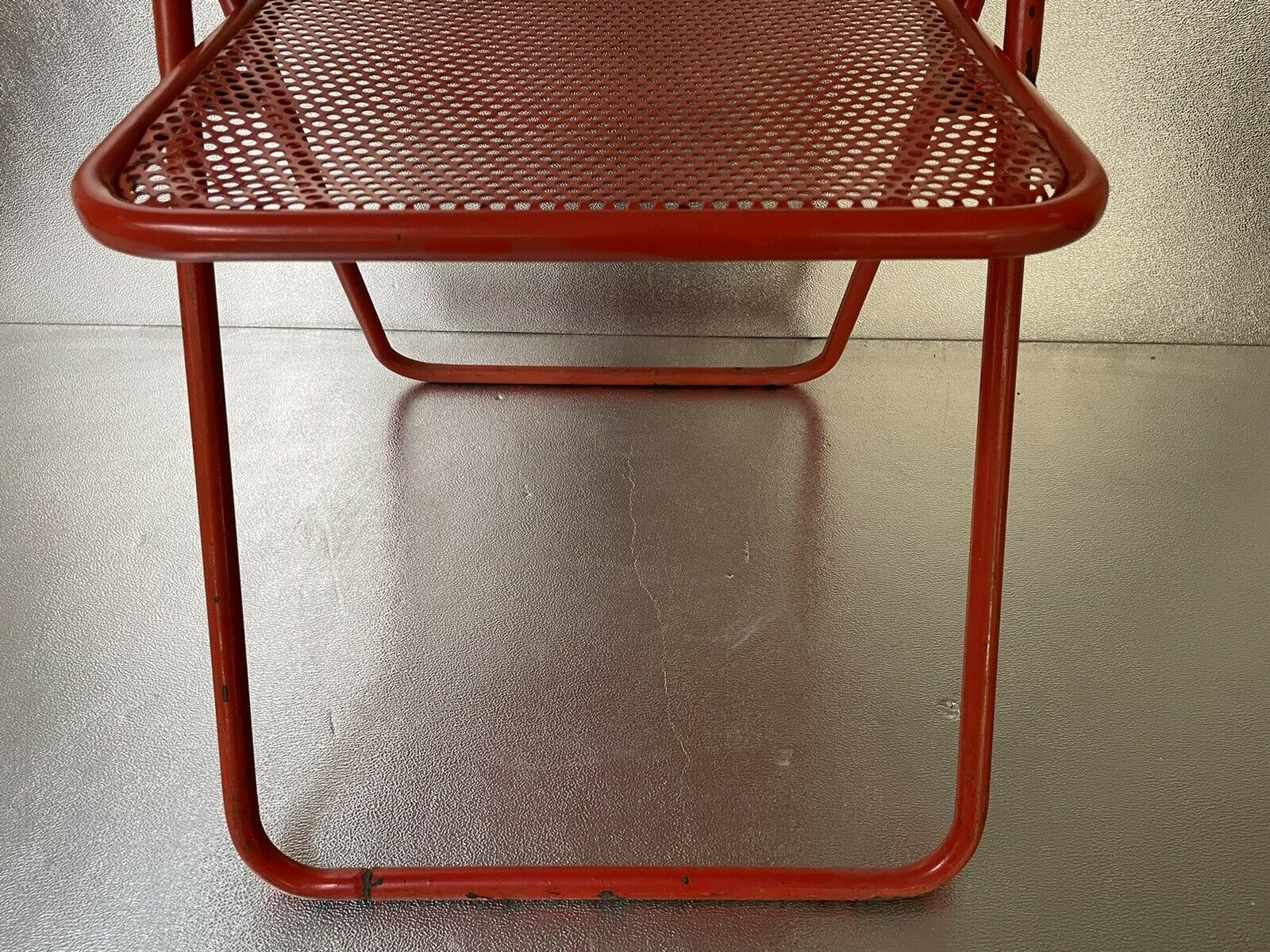 Old folding chair metal perforated red 60s, 70s, vintage