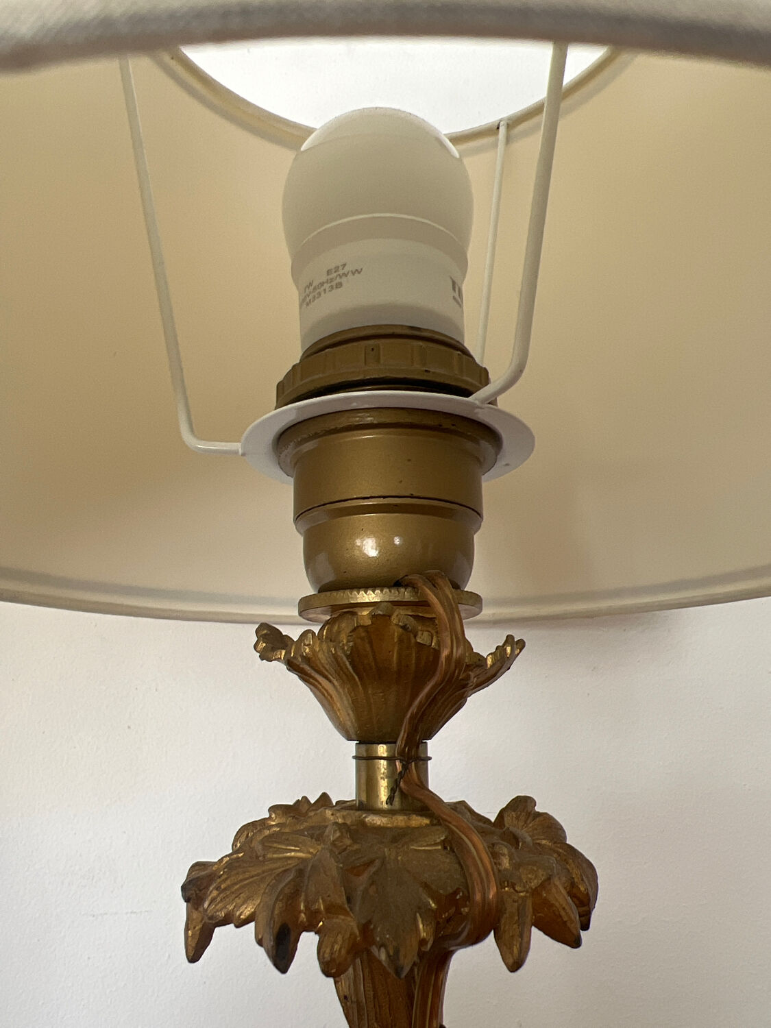Pair of bronze lamps with puttis