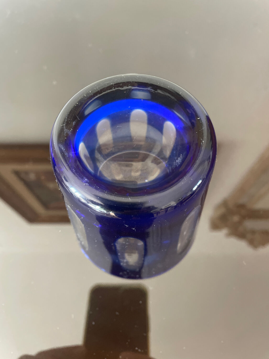 Antique crystal glass lined blue.