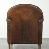 Armchair / lounge chair made of sheepskin leather with characterful patina