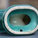 Two green ceramic candlesticks from the 1930s-1940s.