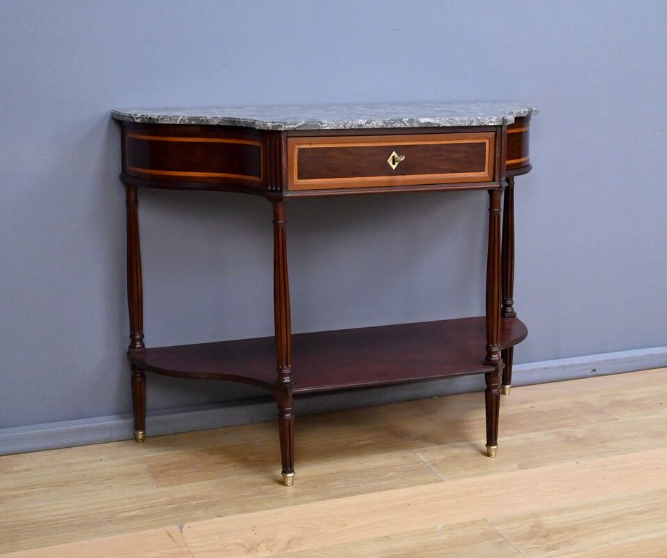 Console in mahogany and marble, Louis XVI period – late 18th century.