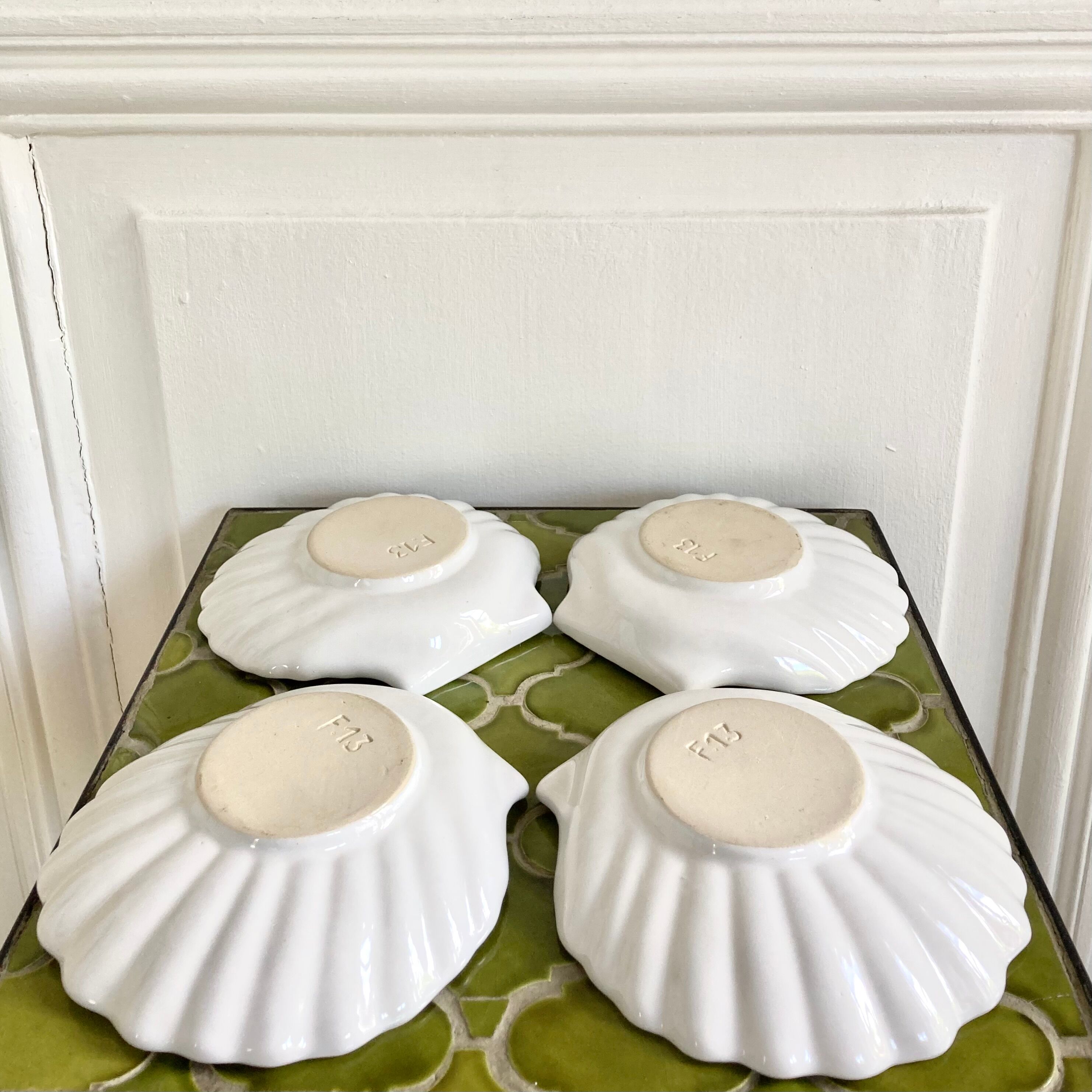 Empty scallop cups ceramic pockets