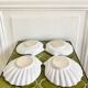 Empty scallop cups ceramic pockets