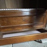 Antique wardrobe with a mirror door.