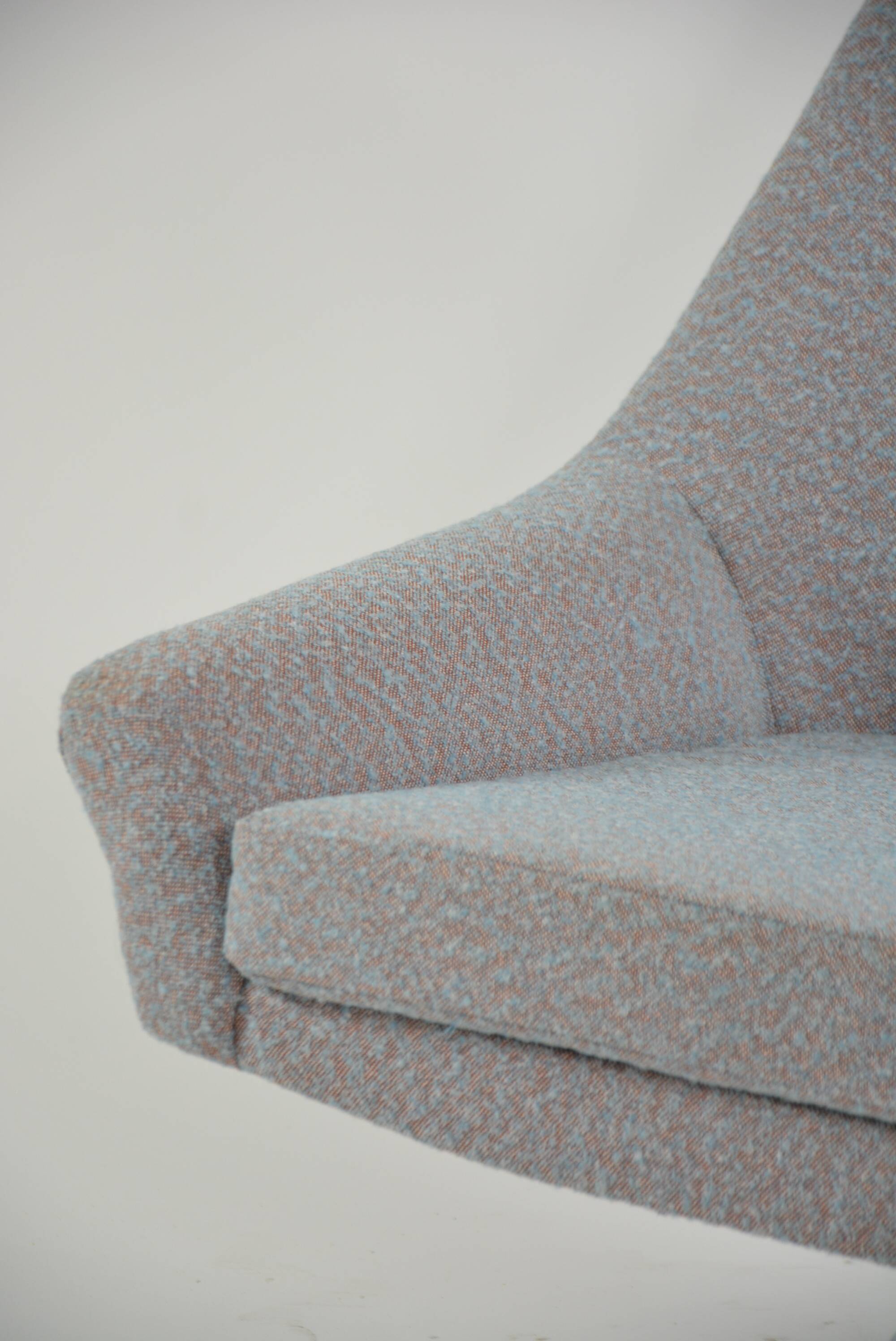 Modernist shell armchairs from the 1970s.