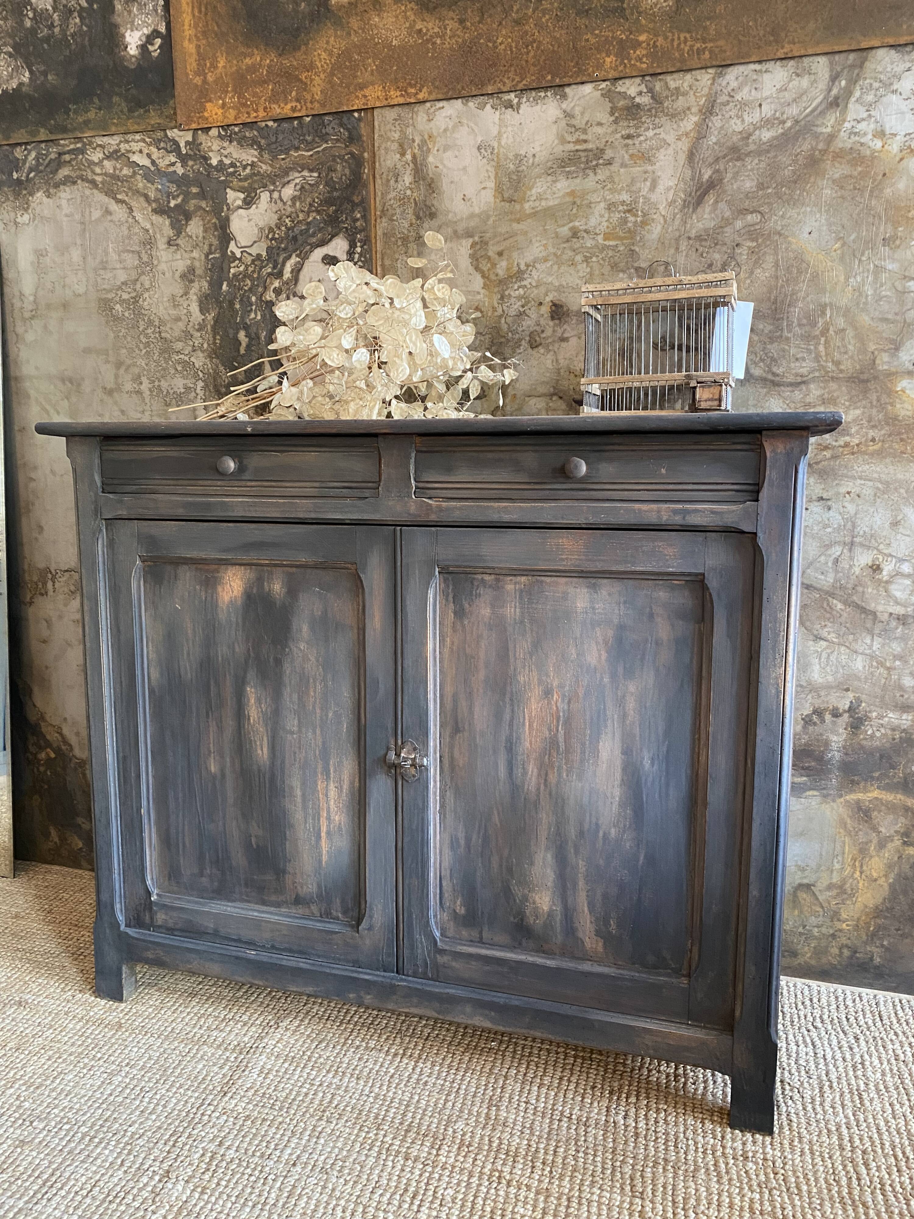 Parisian buffet in its blackened patina