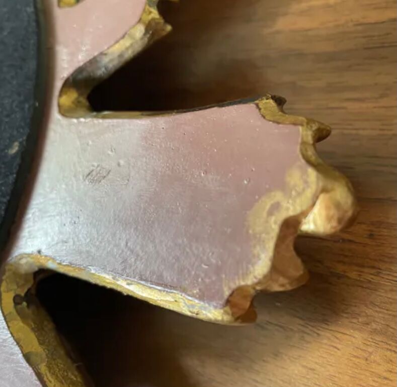 Vintage sun mirror in golden resin 60s/70s