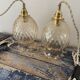 Set of two vintage golden glass handhelds