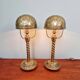 Pair of table lamps in bronze and brass, early 20th century.