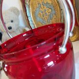 Vintage crystal ice bucket with silver-plated handle.